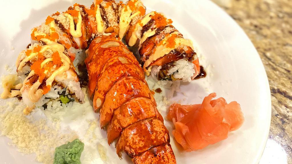 Lobster Roll · Contain raw food. Lobster tempura, avocado; topped with crab stick and shrimp served with a special sauce, crunchy and masago.