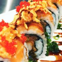 God Father Roll · Contain raw food. Shrimp tempura, soft shell crab, cucumber topped salmon and spicy crab, to...