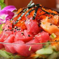 Deejai Poke Bowl · Contain raw food. Tuna, salmon, hamachi, with house sauce, rice, lettuce, avocado, cucumber,...