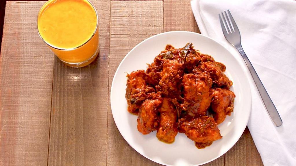 Chicken 65 · Spicy and crispy chicken pieces tempered with aromatic spices and herbs.