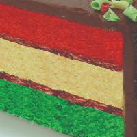 Rainbow Cake · Three colorful sponge cake layers are filled with sweet Raspberry jam and almond marzipan to...