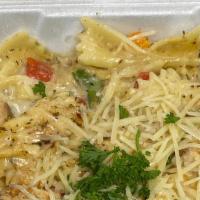 Jerk Chicken Alfredo Pasta · Yeah i said it! We put our jerk chicken in bow tie wheat pasta and covered it with our own s...