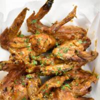 “Trap” Wings (3) · First we put the wings in our signature smoke, then flash them crispy and toss them in our “...