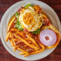 District 23 Burger · Beef Burger topped with lettuce, tomato, onion, cheese, bacon, with special sauce. Served wi...