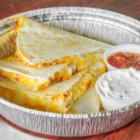 Chicken Quesadilla · Served with lettuce, and sour cream.