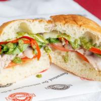 Pesto Chicken Sandwich · All natural grilled chicken, provolone, parmesan, spinach, tomato, roasted red pepper, and b...
