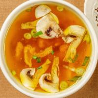 Clear Soup · Clear soup with fried onion and mushroom.