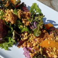 Spring Salad · Kale sprouts, Tuscan greens, blueberry goat cheese, golden beets, sunflower seeds, housemade...