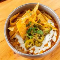 Loaded Chili Bowl · Our homemade chili, grit cornbread, shredded cheddarjack cheese, pickled jalapeno, cilantro ...
