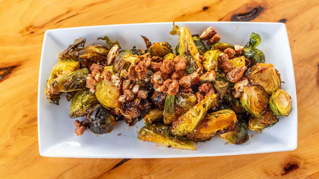 Brussel Sprouts · Gluten free, vegetarian. Roasted brussel sprouts. Apple and fig gastrique. Candied pecans.