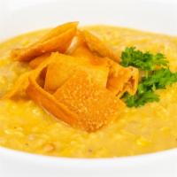 Red Lentil Soup · Creamy, nutty and slightly citrusy red lentil soup served with pita crisps.