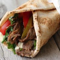 Beef Shawarma · Fresh Beef Shawarma Wraps, the most popular street food in the Middle East. Made with flank ...