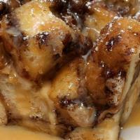 Donut Bread Pudding · Chocolate-Glazed Do-Nut Bread Pudding with A Salted Caramel Sauce.