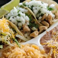 Taco  Box · 3 tacos with your choice of meat. Topped with fresh cilantro and onion. Served with a side o...