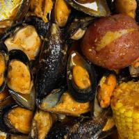 Black Mussels · served corn and potato.