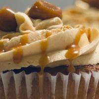 Salted Caramel · Tender cake filled with scratch made caramel and topped with caramel buttercream