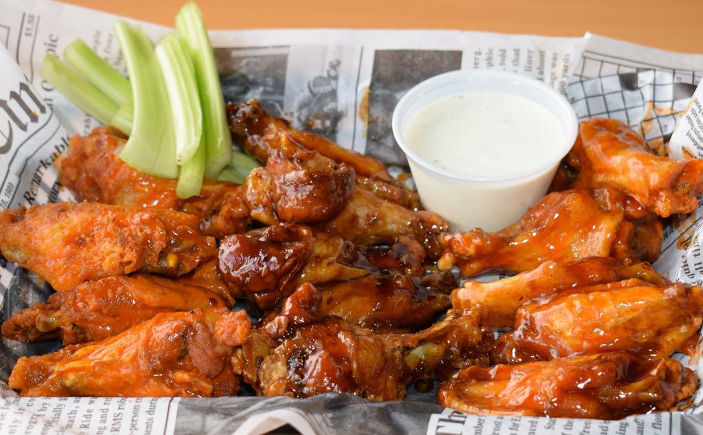 Traditional Wings (10) · 10 mouthwatering traditional chicken wings in your choice of sauce. Served with 2 cups of Ranch or Blue Cheese.