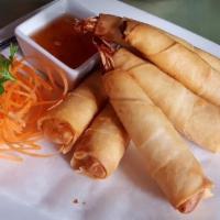 Bikini Prawn · Marinated prawns and chicken, hand wrapped in wonton wrappers. Deep fried to golden brown. S...