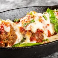 Meatballs · Beef and pork meatballs sizzled in Pomodoro Sauce.