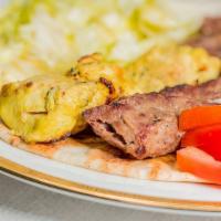 Kabobi Sampler · Combination of all three kabobs, pita, and salad. (Beef, & chicken, & ground beef, and lamb).