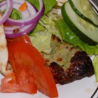 Spicy Chicken Kabob Wrap · Ground chicken, cooked in char grill, marinade with chopped onion, jalapeño, served with let...