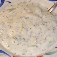 Yogurt Dip · Homemade yogurt with cucumber, onion, garlic, and dry mint.