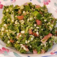 Tabouli Salad · Parsley, cucumber tomato, and our spices with house dressing.
