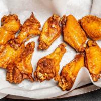 10 Wings · Choice of hot buffalo, mild buffalo, or BBQ sauce, served with ranch or blue cheese dressing.