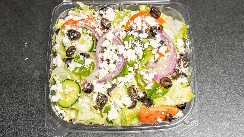 Greek Salad · No meat. Romaine lettuce, tomatoes, cucumbers, feta cheese, red onions, black olives, green peppers and pita.