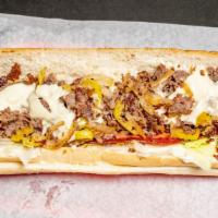 8 Inch Steak & Cheese Sub · Comes with mayo, lettuce, tomato, grilled onions.