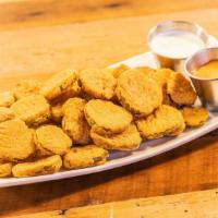 Fried Pickles · House breaded thick-cut pickles, served with boom boom sauce and homemade ranch.