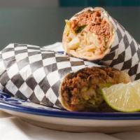 Burrito De Lomo · A large flour tortilla filled with marinated pulled pork loin, lettuce, cheese, and tomatoes.