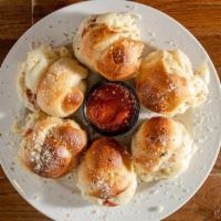 Stuffed Garlic Knots With Cheese · (6) Delicious Homemade Garlic Knots stuffed with mozzarella cheese.