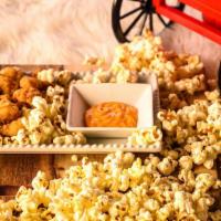 Poppin' Popcorn Shrimp · Our deluxe twist on a classic. Crunchy fried shrimps, accompanied by popcorn and homemade sa...