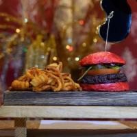 Organic Velvet Burger · With lettuce, tomato, red onion, pickles, cranberry sauce served on a burgundy beet bun.