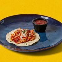 Taco · Your choice of meat with diced onion, cilantro, and salsa