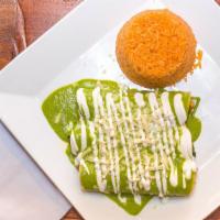 Spinach & Chicken Enchiladas · Three chicken enchiladas filled with sautéed spinach topped with a creamy poblano sauce. Ser...
