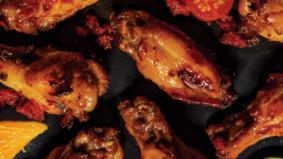 District Party Wings · Jumbo bone in or boneless wings Choice ranch or blue cheese tossed in Your choice: buffalo, ...