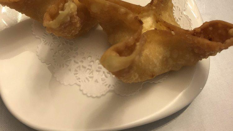 Crab Rangoon · Five pieces. Crispy wonton stuffed with crab meat and cream cheese.