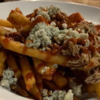 Hickory Fries · Served with blue cheese, smoked pork debris, and blackberry BBQ sauce.