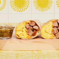 Turkey Sausage Breakfast Burrito · Two scrambled eggs, turkey sausage, breakfast potatoes, and melted cheese wrapped in a fresh...