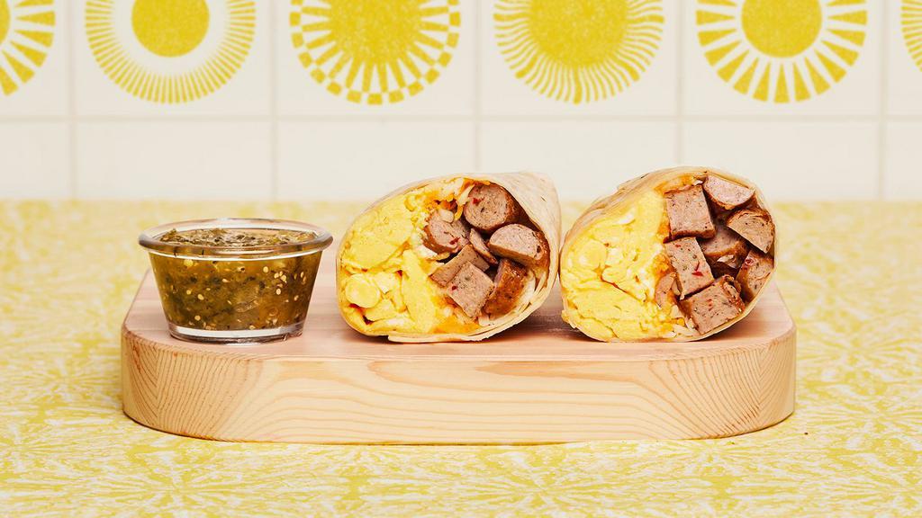 Turkey Sausage Breakfast Burrito · Two scrambled eggs, turkey sausage, breakfast potatoes, and melted cheese wrapped in a fresh flour tortilla.