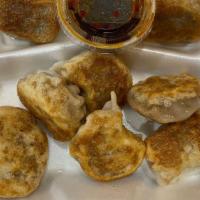 Fried Dumplings(8) · 8 pieces. stuffed dough cooked in oil.