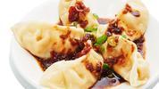 Veggie Gyoza · vegetable dumplings | cabbage | shiitake mushrooms | garlic | carrot | daikon radish | ginger in a black vinegar | rayu chili oil sauce