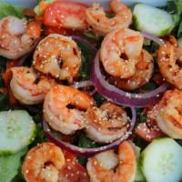 Shrimp Salad · 12 Shrimp On A Bed Of Romaine Lettuce / Cucumbers / Carrots / Onions /  Tomatoes / Garnished...