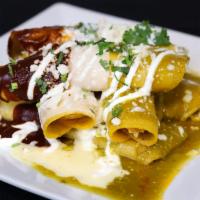 Torre Mexicana · Two Chicken Enchiladas / Two Beans Enchiladas / Two Cheese Enchiladas / Stacked Up / Covered...