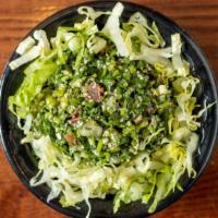 Tabouli Salad · Cracked wheat, parsley, tomato, onion with lemon juice.