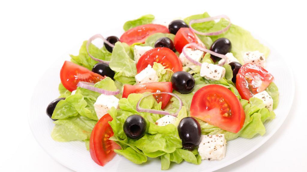 Greek Salad · Crisp romaine lettuce, onion, tomato, cucumber, pepper, kalamata olives, feta cheese and pepperoncini.
