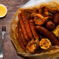 Kings Feast · One snow crab cluster, ten shrimp, two corn, and three potatoes. (Sausage is not included bu...