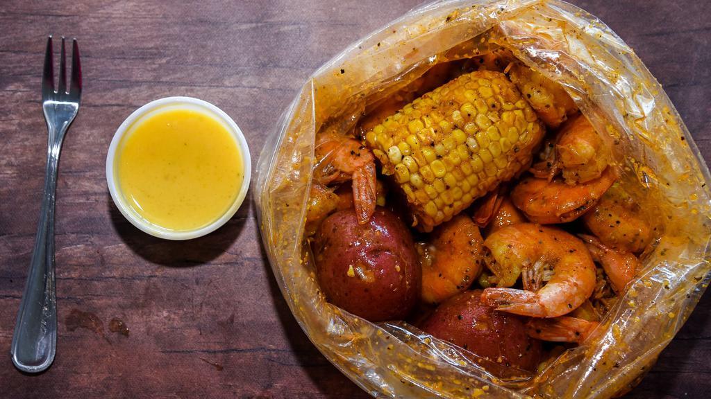 Shrimp Bag · Twelve jumbo shrimp, one corn, and two potatoes.You can add a cluster, lobster tail, sausage, egg or broccoli. You can also make it as Juicy as you like!